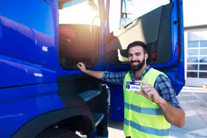 truck driver flexing CDL - featured image