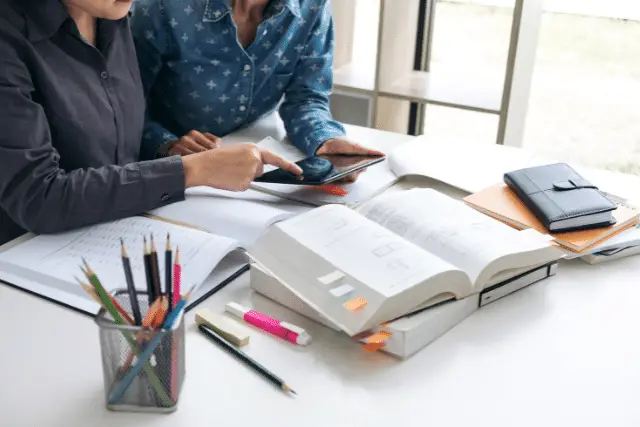 teacher helping student prepare for test - featured image