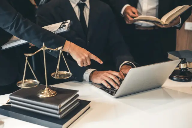 lawyers using laptop - featured image