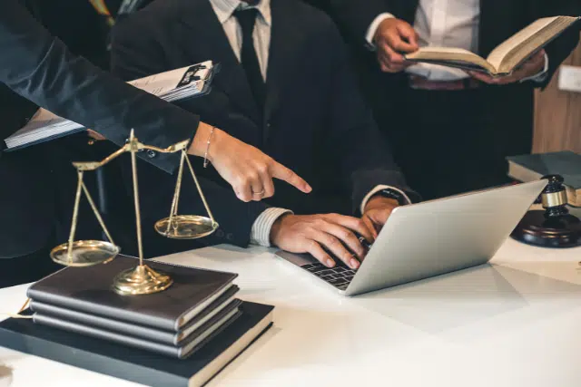 lawyers using laptop - featured image