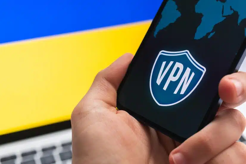 person holding a vpn device - featured image