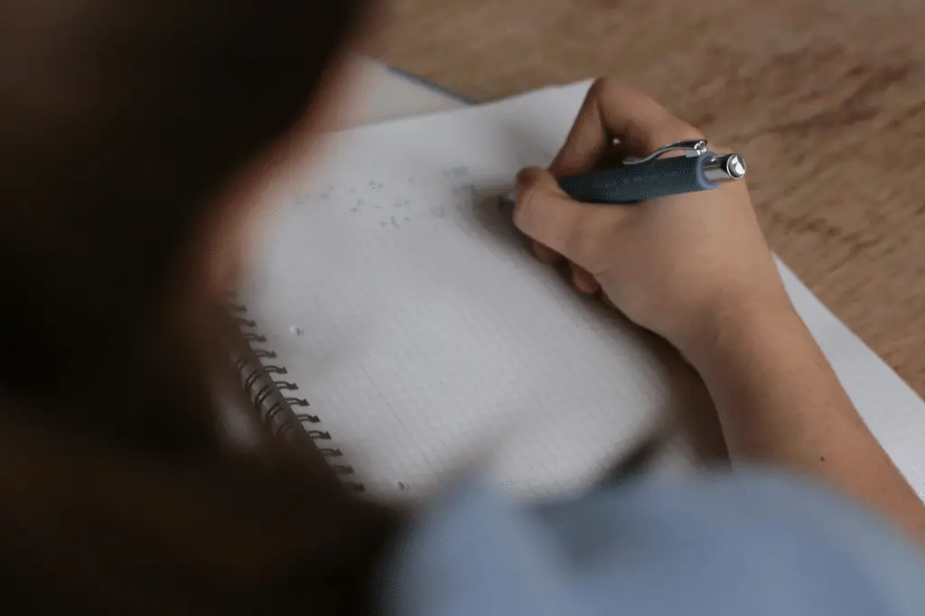 young woman taking an exam - featured image