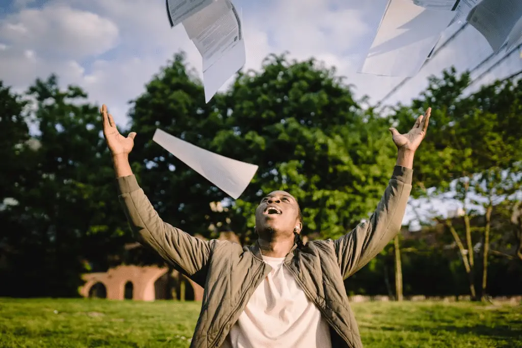 male jubilant graduate - featured image