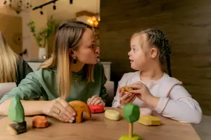 teacher and autistic child - featured image